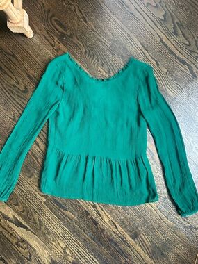 Sezane long sleeve blouse with bow back detail.